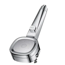 Chrome shower head with stop button.