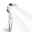 Chrome shower head with water stream.