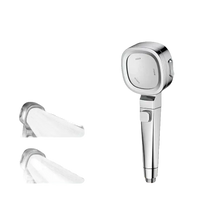 Silver shower head with multiple spray settings.