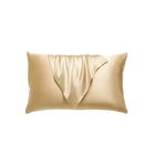 Golden silk pillowcase with draped fabric.