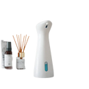 White automatic soap dispenser.
