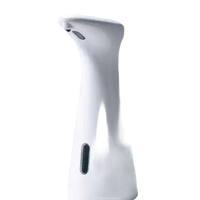 White automatic soap dispenser.