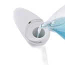 White automatic soap dispenser being filled.