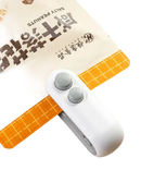White bag sealer.