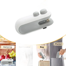 Portable white and gray bag sealer.