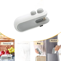 Portable white and gray bag sealer.