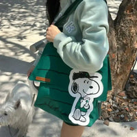 Green Snoopy messenger bag.
