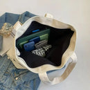 Open tote bag with contents.