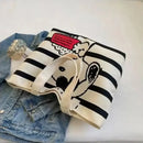 Striped tote bag with cartoon character.