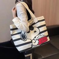 Striped tote bag with Snoopy design.