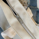 Canvas tote bag with zipper.
