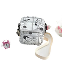 White Snoopy comic-strip crossbody bag.