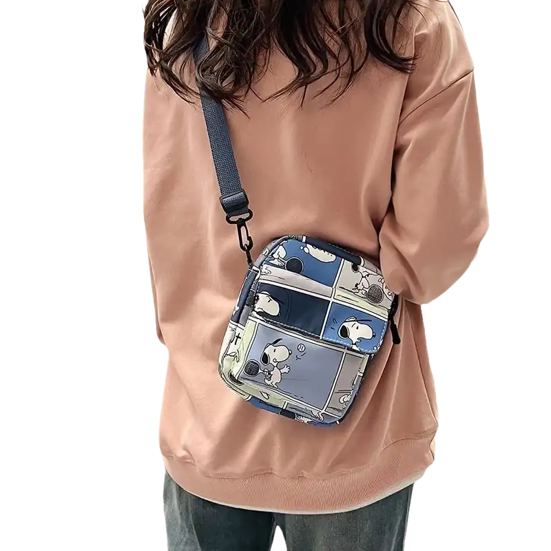 Snoopy comic-strip crossbody bag.