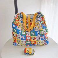 Snoopy-themed reusable shopping bag with yellow straps.
