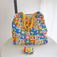 Colorful Snoopy-themed tote bag with yellow straps.