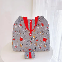 Striped Snoopy-themed reusable shopping bag.