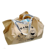 Peanuts-themed tote bag.