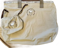 Beige tote bag with Snoopy.