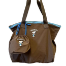Brown tote bag with Snoopy design.