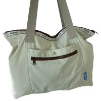Light green tote bag with gray straps.