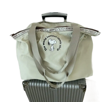 Snoopy-themed travel bag.
