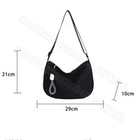 Black shoulder bag with dimensions.