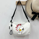 White Snoopy shoulder bag.
