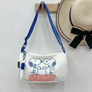 White Snoopy shoulder bag.