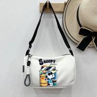 White Snoopy shoulder bag.