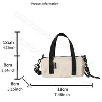 Cylindrical white handbag with black straps.