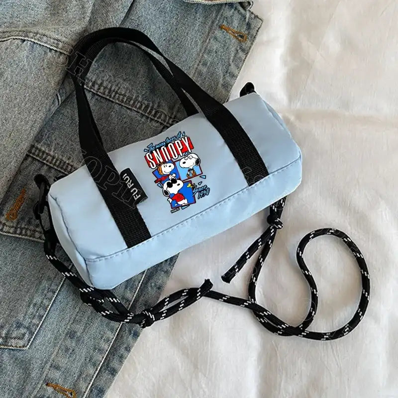 Light blue Snoopy barrel bag.