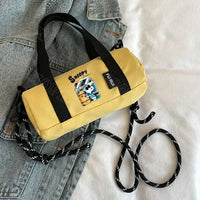 Yellow Snoopy barrel bag.