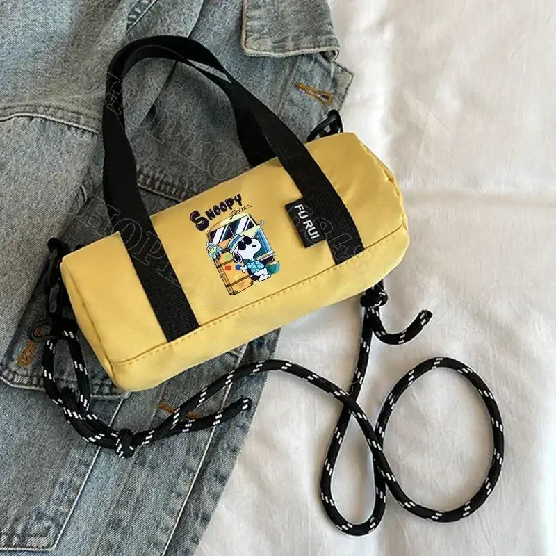 Yellow Snoopy barrel bag.