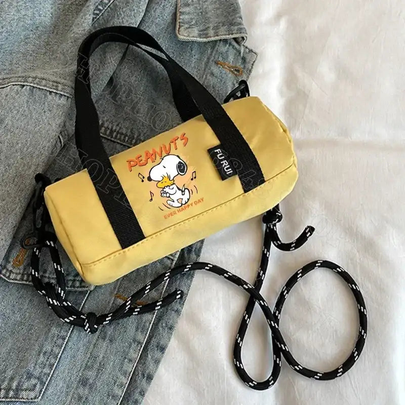 Yellow cylindrical bag with Snoopy design.
