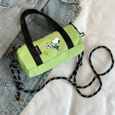 Green barrel-shaped bag with Snoopy design.