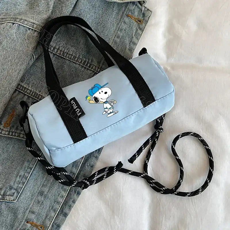 Light blue Snoopy barrel bag.