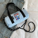 Light blue Snoopy barrel bag.