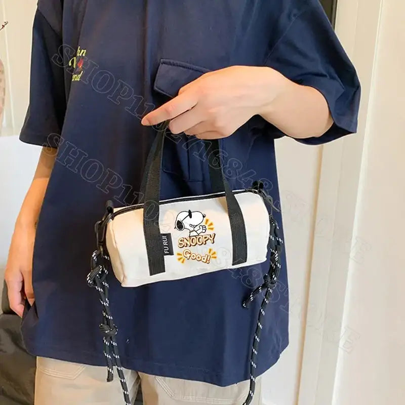 White Snoopy barrel bag.