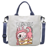 Canvas tote bag with cartoon design.