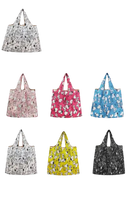 Foldable Snoopy-themed shopping bags in various colors.