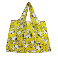 Yellow Snoopy-patterned tote bag.