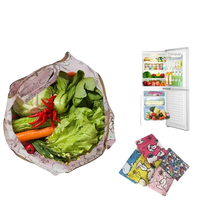 Reusable grocery bag filled with vegetables.