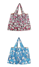 Two Snoopy-themed reusable shopping bags.