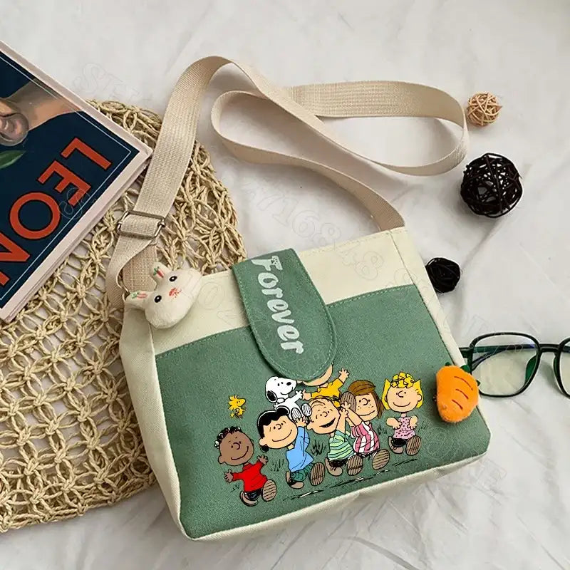 Cartoon-themed canvas shoulder bag.