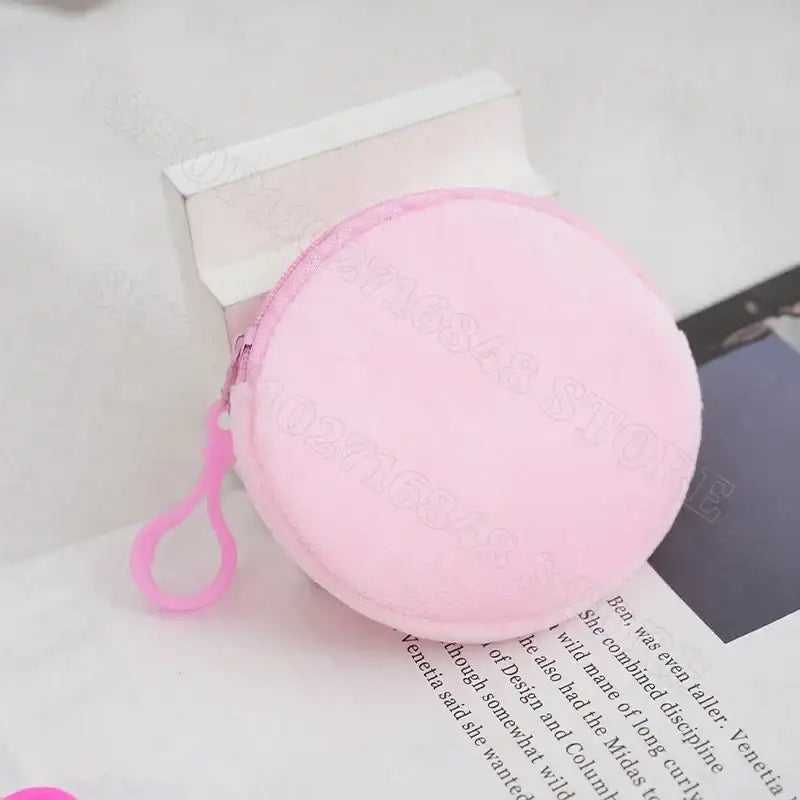 Round pink coin purse.