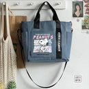 Blue tote bag with Snoopy design.