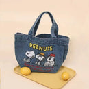 Denim Peanuts character tote bag.
