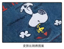 Snoopy embroidery on denim.