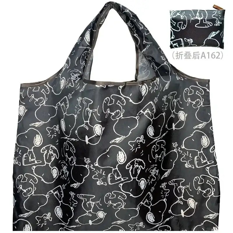 Black reusable shopping bag with Snoopy pattern.
