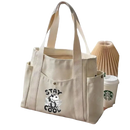Canvas tote bag with side pockets.